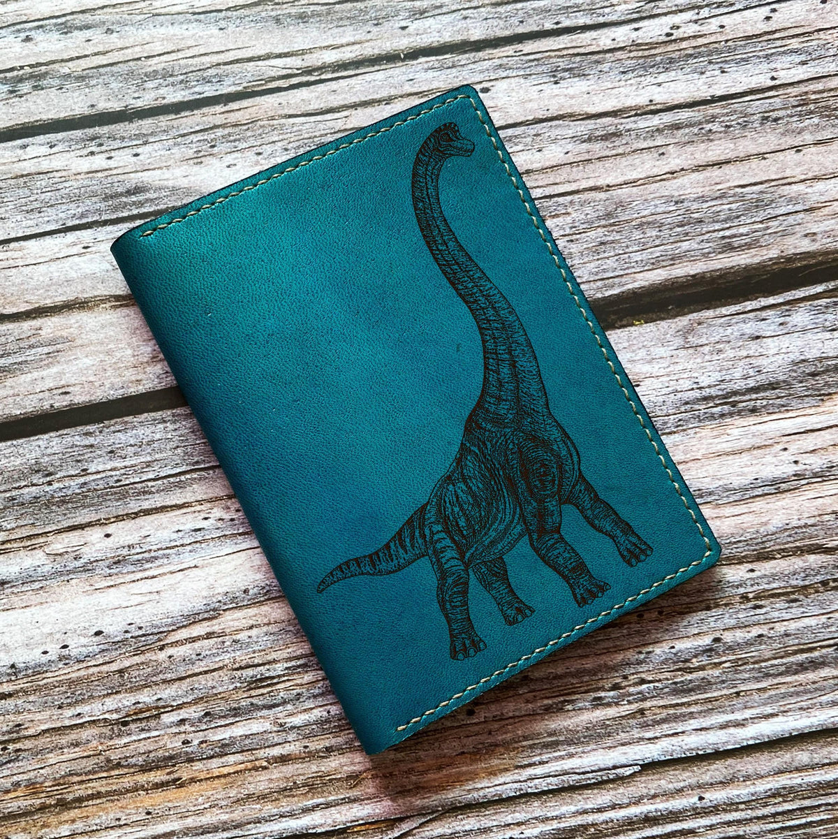 Handcrafted Leather Passport Wallet: Diplodocus Dinosaur Engraving